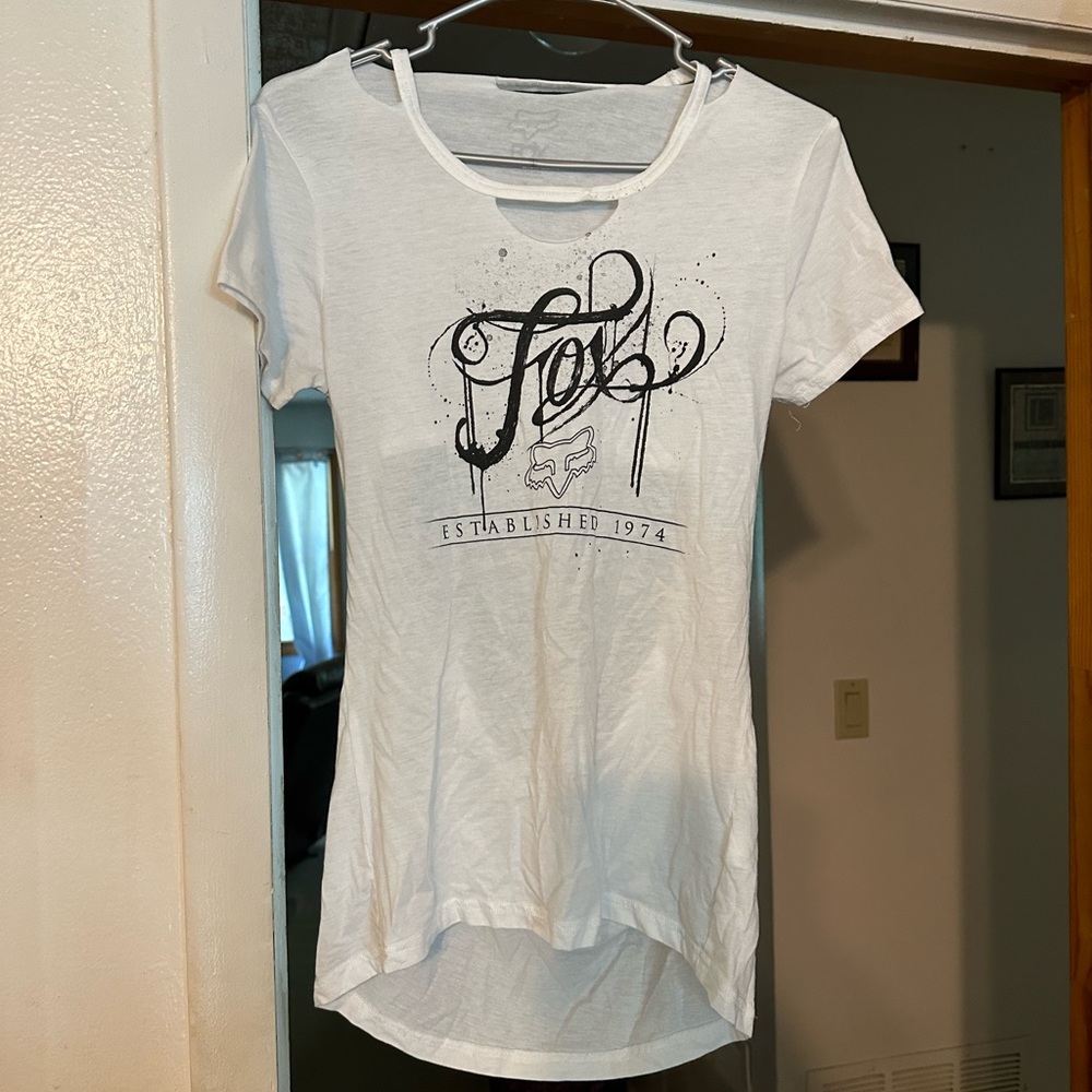 White shirt with a cute hole in the back